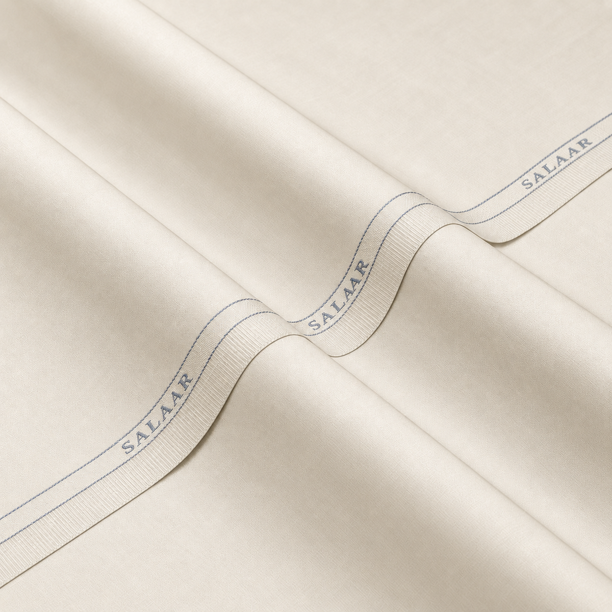SALAAR Ivory Crown Summer Blend fabric with woven SALAAR selvedge border