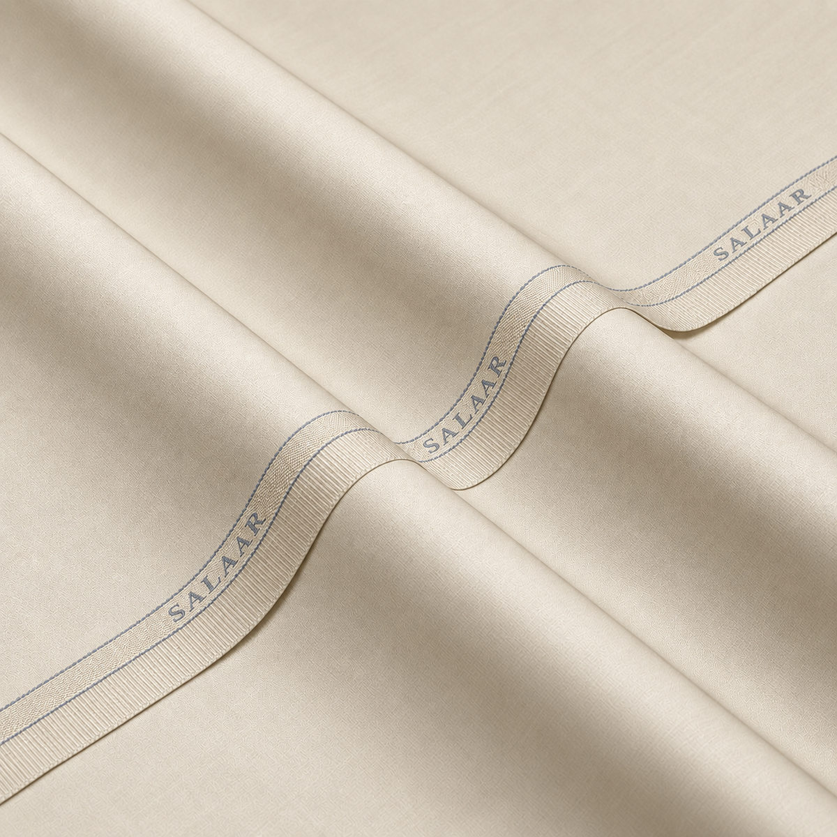 SALAAR Ivory Majestic Egyptian Cotton fabric with woven SALAAR selvedge border