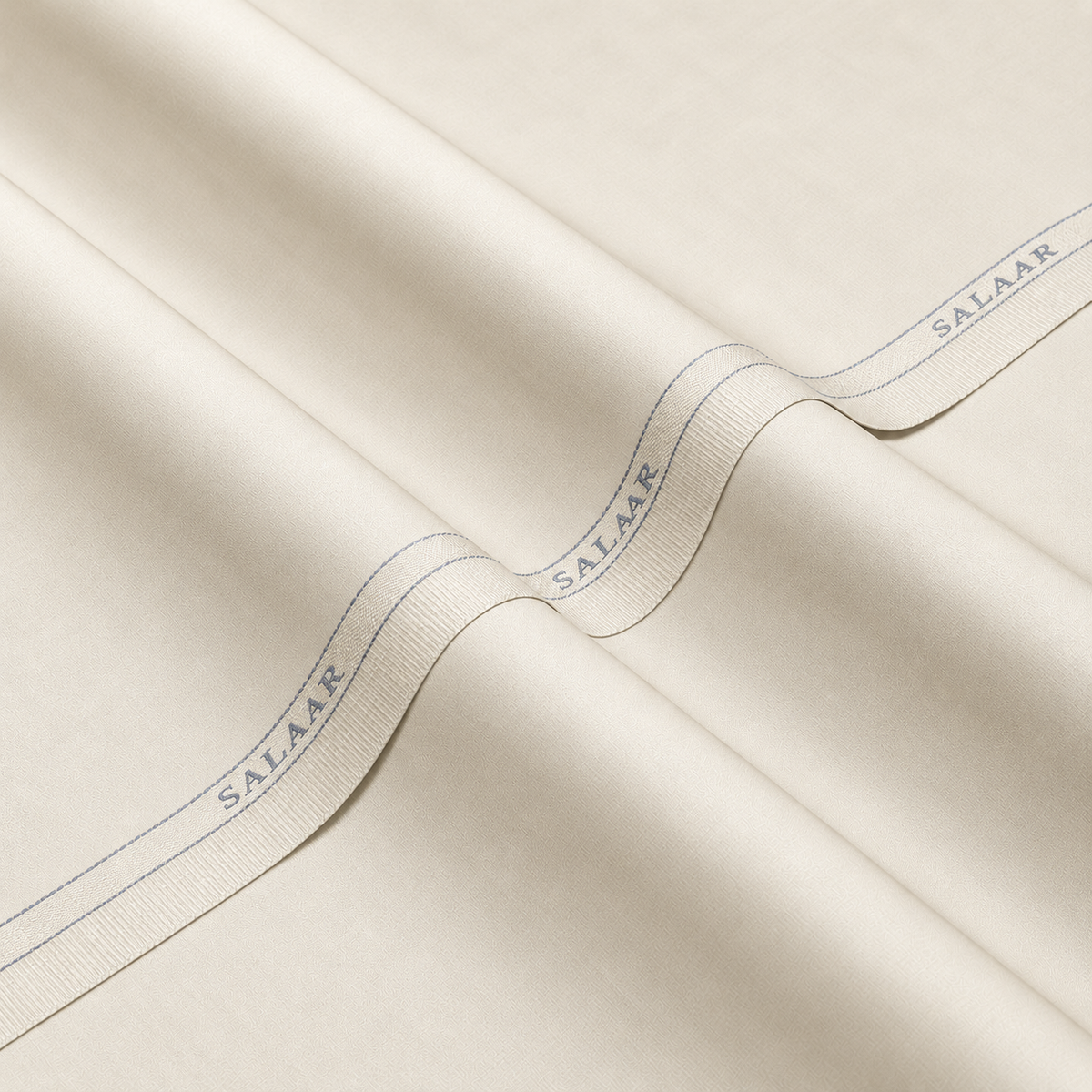 SALAAR Ivory Manor Signature Blend fabric with woven SALAAR selvedge border
