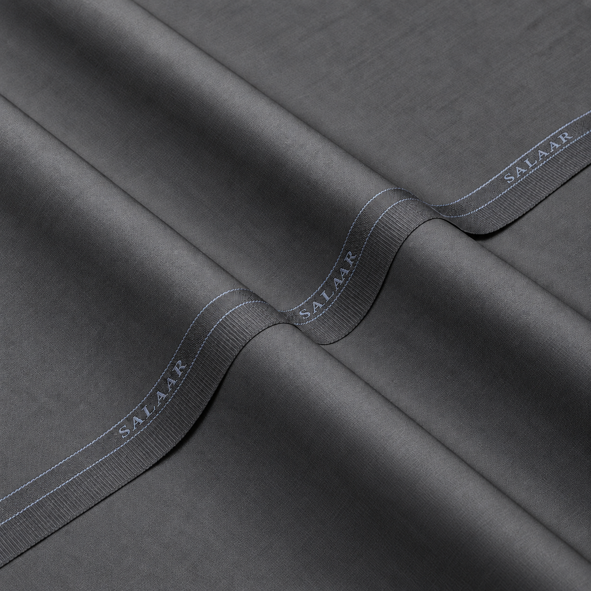 SALAAR Platinum Grey Signature Blend fabric with woven SALAAR selvedge border