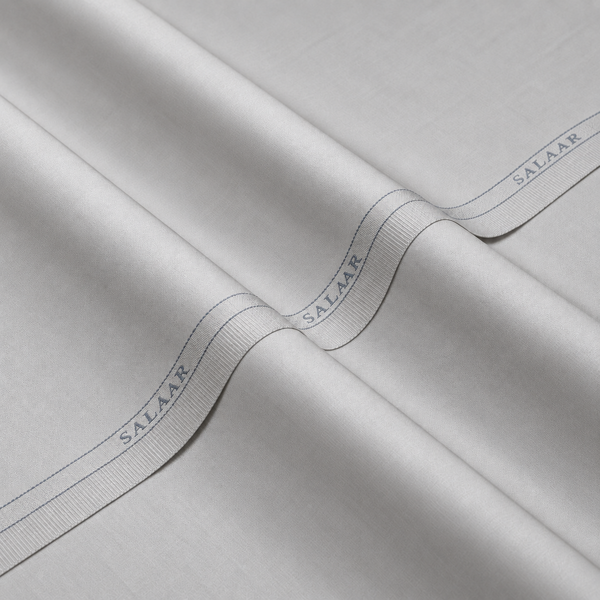 SALAAR Silver Pearl Egyptian Cotton fabric with woven SALAAR selvedge border