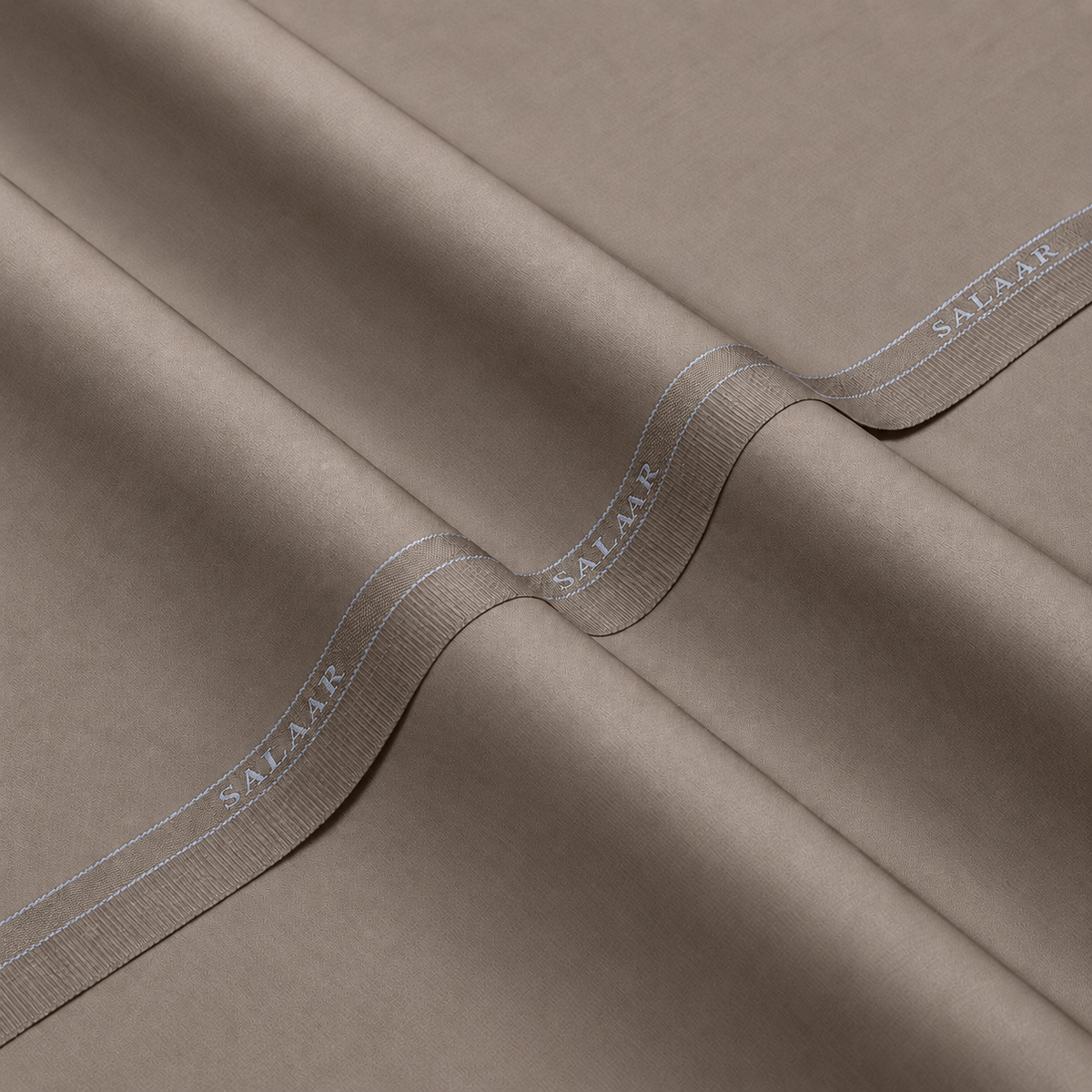 SALAAR Taupe Royale Signature Blend fabric with woven SALAAR selvedge border
